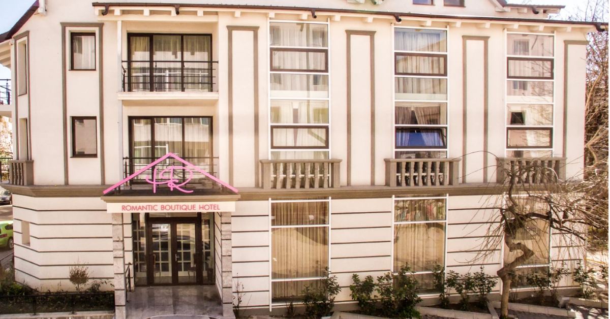 Boutique Romantic building façade in Focșani, daytime view